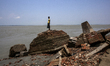 People walks in Bhola, Bangladesh, on May 24, 2016 after the Cyclone Roanu. Cyclone Roanu...