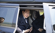Lee Jae-myung, along with Democratic Party leaders and lawmakers, gets into a vehicle afte...