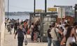 Crowded bus stops and large queues occur at Cais Sodre due to the lack of electricity in L...