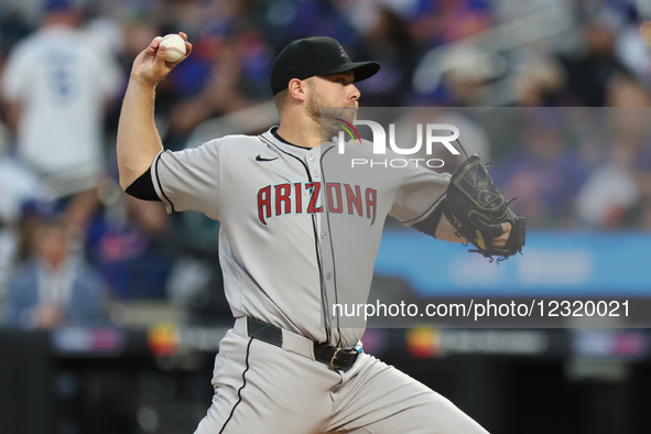 Arizona Diamondbacks starting pitcher Corbin Burnes #39 throws during the third inning of the baseball game against the New York Mets at Cit... by Gordon Donovan/NurPhoto