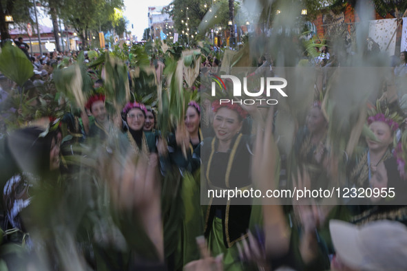 In Indonesia, dancers perform as part of an international cultural event. 