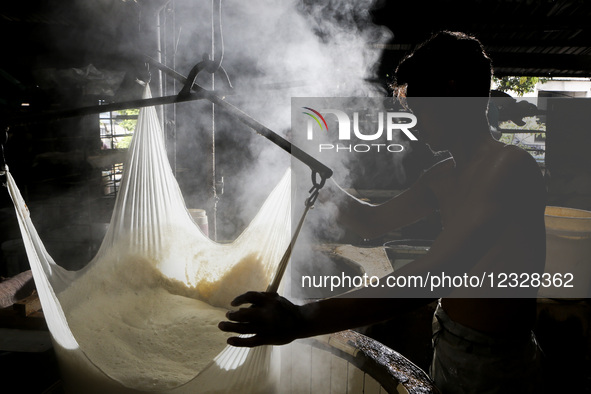 A worker processes soybeans to make tofu at a traditional tofu factory in Solo, Central Java, Indonesia, on May 1, 2025. Although tofu is a... by Agoes Rudianto/NurPhoto