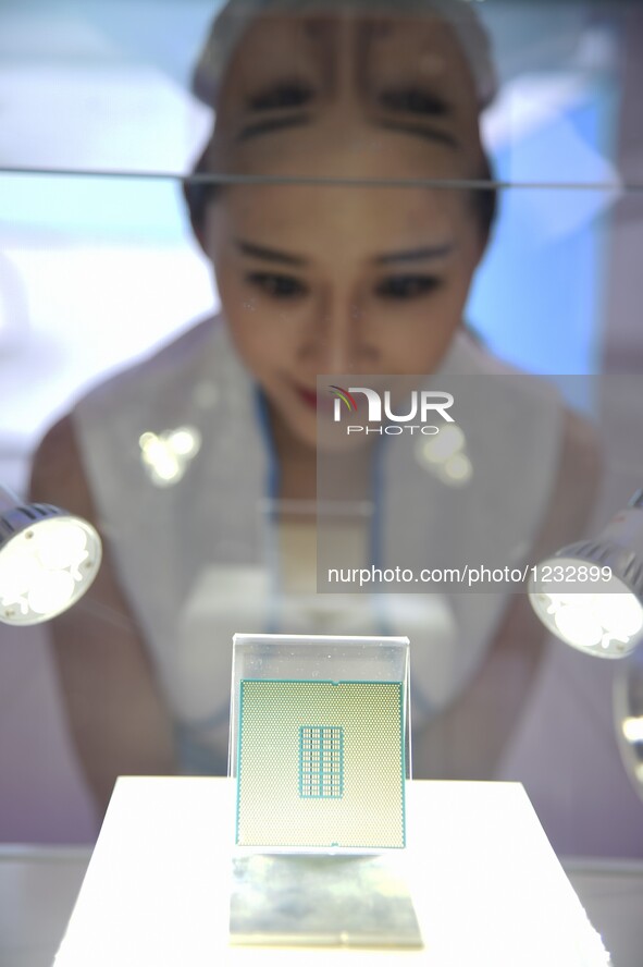 A chip made in China is shown on Guiyang International Big Data Expo 2016 in Guiyang, capital of southwest China's Guizhou Province, May 25,...