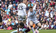 Lucas Pires #23 of Burnley FC is fouled by Luke Cundle #25 of Millwall F.C. during the Sky...