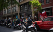 Over one hundred activists and their supporters stage a peaceful protest outside the Tesla...