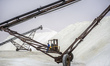 Salt on a conveyor belt at a salt factory near Swakopmund, Namibia, on Wednesday, May 25,...