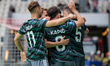 Lechia Gdansk players celebrate scoring a goal during the game between KS Cracovia and Lec...