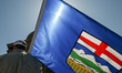 EDMONTON, CANADA - MAY 3:A participant holds an Alberta flag as Alberta sovereigntists an...