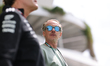 A man walks through the paddock at the Miami International Autodrome in Miami, Florida, on...