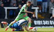 Forest Green Rovers' Harvey Bunker competes with Hartlepool United's Louis Stephenson duri...