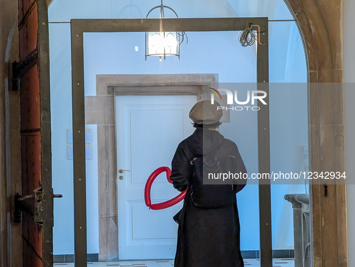 Woman Holding Heart-Shaped Balloon