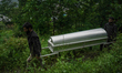 Family members carry the coffin in Uri town, Baramulla district, north of Srinagar, Indian...