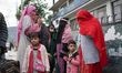People move to safer locations in Uri town, Baramulla district, north of Srinagar, Indian-...