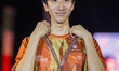 Silver medalist Ryoichi Akamatsu of Japan poses on the podium during the medal ceremony of...
