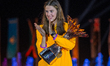 Yaroslava Mahuchiki of Ukraine celebrates with the trophy on the podium during the medal c...