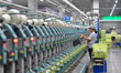A worker works in a workshop of a textile products manufacturing enterprise in Qingzhou Ec...