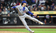 Chicago Cubs pitcher Tom Cosgrove #38 throws during the eighth inning of a baseball game a...