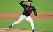 New York Mets starting pitcher Clay Holmes #35 throws during the fifth inning of a basebal...