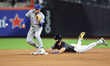 New York Mets player Pete Alonso #20 doubles during the fourth inning of a baseball game a...