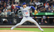 Chicago Cubs starting pitcher Jameson Taillon #50 throws during the first inning of a base...