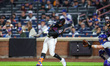 New York Mets' Jeff McNeil #1 hits a solo home run during the second inning of a baseball...
