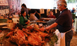 A man runs a barbacoa stand during the 2025 Barbecue Fair in the Xochimilco borough of Mex...