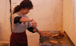 A woman prepares barbacoa tacos during the 2025 Barbacoa Fair in the Xochimilco borough of...