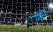 Akram Hassan Afif of Al Sadd SC scores a penalty in the shootout during the Qatar Cup Fina...
