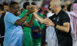 Felix Sanchez Bas (L), Head Coach of Al Sadd SC, celebrates the victory after winning the...