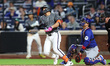 New York Mets player Tyrone Taylor #15 singles during the seventh inning of a baseball gam...