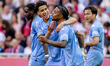 NEC player Sami Quaissa (left) and NEC player Sontje Hansen (right) celebrate during the g...