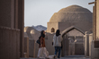 Two young Iranian women visit the Citadel of Bam, which is nearly destroyed by a powerful...