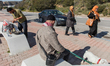 Fergie Chambers sits on a public bench and waits for his Turkish coffee, which a street ve...