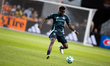 Seattle Sounders player Nouhou Tolo participates in a match between Houston Dynamo and Sea...