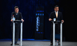Pro-European independent presidential candidate and Bucharest Mayor Nicusor Dan, left, att...