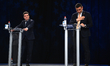 Pro-European independent presidential candidate and Bucharest Mayor Nicusor Dan, left, att...