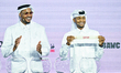 Former American basketball player and FIBA Global Ambassador, Carmelo Anthony (L), and Qat...