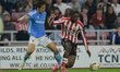 Sunderland's Romaine Mundle wins the ball against Coventry City's Tatsuhiro Sakamoto durin...