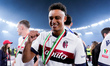 Dan Ndoye of Bologna FC celebrates the victory of the trophy at the end of the Coppa Itali...