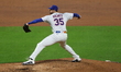 New York Mets starting pitcher Clay Holmes #35 throws during the sixth inning of a basebal...