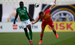 Tomislav Papazov (right) of Birkirkara heads the ball ahead of Jork Eblin Becerra Portocar...