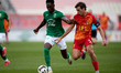 Alex Satariano (right) of Birkirkara plays against Cedric Serge Guy Yameogo of Floriana du...