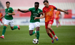 Alex Satariano (right) of Birkirkara plays against Cedric Serge Guy Yameogo of Floriana du...