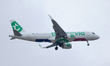 An F-HXSN Transavia France Airbus A320neo flies over the match venue during the Meridianbe...