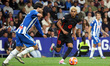 Leandro Cabrera and Lamine Yamal play during the match between RCD Espanyol and FC Barcelo...