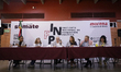 Nadya Rasheed (blue suit), the Palestinian ambassador to Mexico, stands with Rafael Baraja...