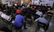 People attend political and cultural activities at the National Institute for Political Tr...