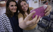 Nadya Rasheed (left), Palestinian Ambassador to Mexico, meets with attendees at the Nation...