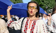 Members of the Lehit folk band and Robymo Vam Nervy NGO wear traditional Ukrainian embroid...