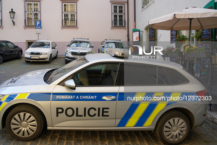 Police Cars In The Old Town Of Prague